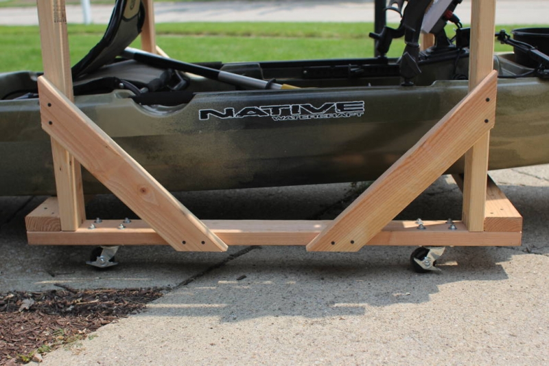 diy rolling kayak storage rack 2x4s and caster wheels